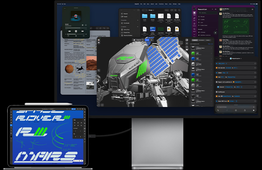 iPad Pro attached to Magic Keyboard, front exterior, all connected to external Mac Studio Display, iPad Pro display with graphic design app, vibrant colours and text, Studio Display showing various apps and a 3D model