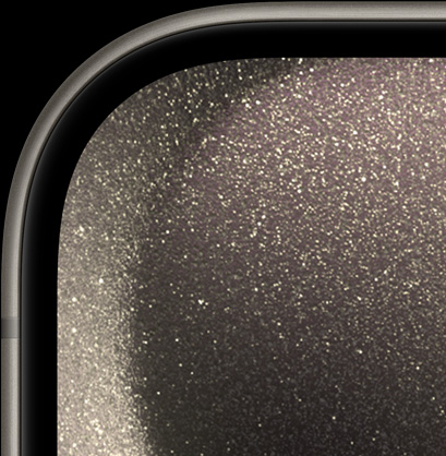 En närbild framifrån på iPhone 15 Pro med de rundande kanterna och den tunna skärmramen