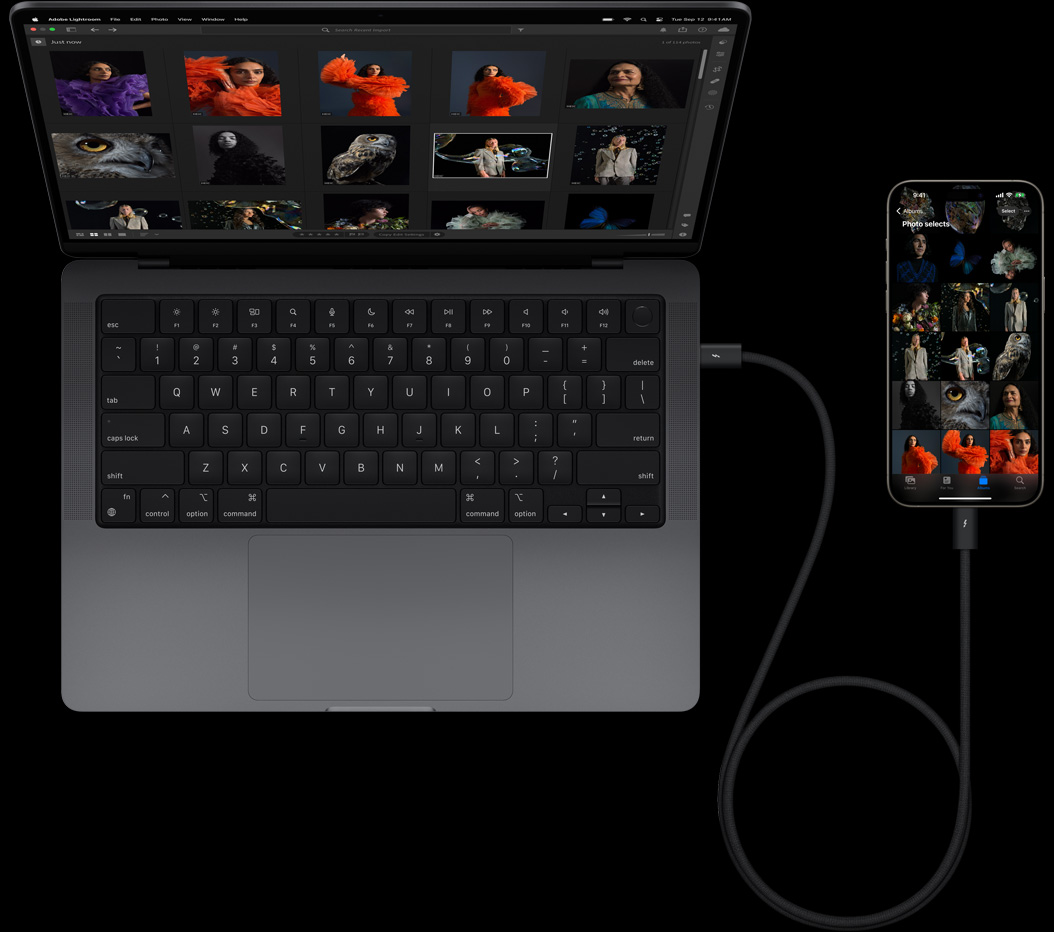 iPhone 15 Pro Max liitettynä 14 tuuman MacBook Prohon USB‑C-johdolla
