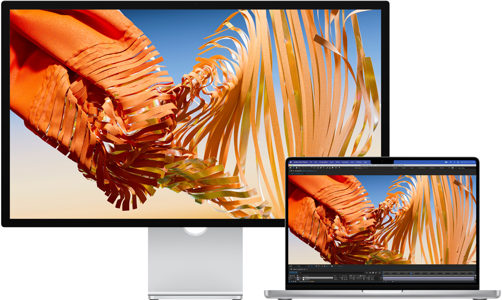 MacBook Pro Studio Displayn vieressä