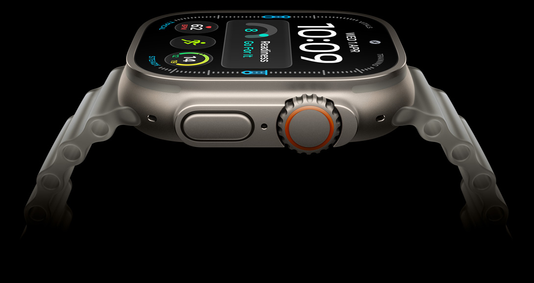 Apple Watch Ultra 4, titanium case, natural colour, digital clock face, complications: readiness, heart rate, Workouts, UV, right side exterior, Digital Crown, raised side button, Ocean Band, translucent grey colour