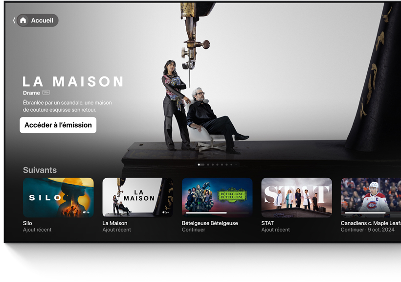 Téléviseur à écran plat montrant l’interface de l’écran d’accueil de l’app Apple TV