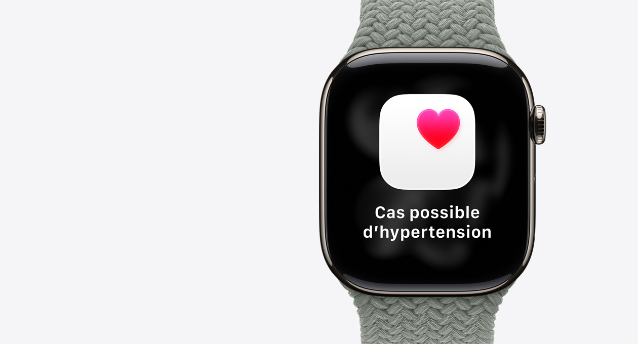 Apple Watch Series 11, natural color, titanium case, possible hypertension notification, pink heart in white box, right side exterior, Digital Crown, band, green gray Braided Solo Loop