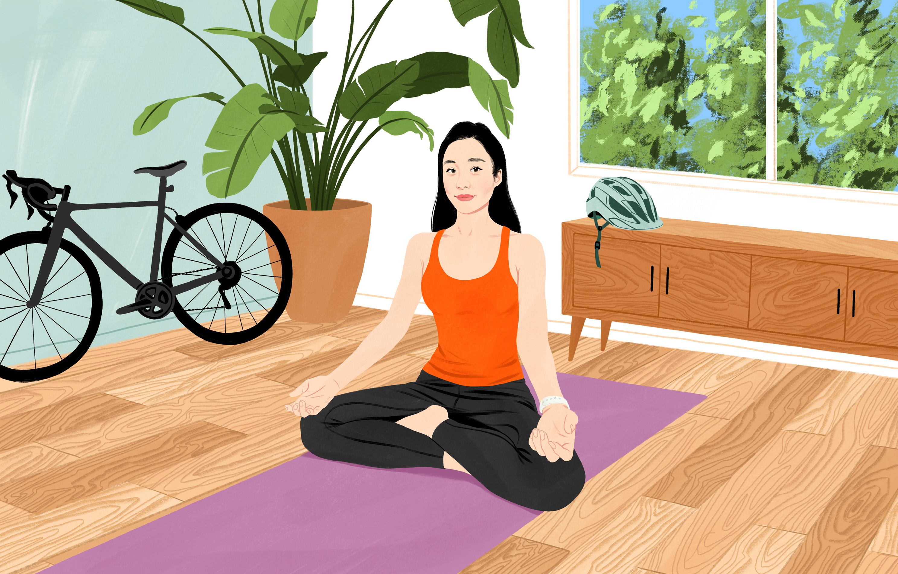 Moony smiling as she begins meditating while sitting cross-legged on the floor in her home.