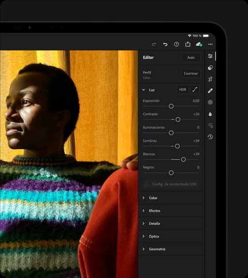 iPad Pro, se muestra una foto en curso de edición de una persona que lleva puesto un abrigo colorido