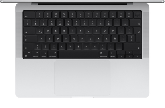Vista desde arriba de un MacBook Pro de 14 pulgadas que muestra el trackpad Force Touch debajo del teclado