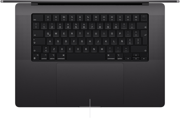 Vista desde arriba de un MacBook Pro de 16 pulgadas que muestra el trackpad Force Touch debajo del teclado