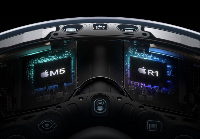 Technical, exploded view inside Apple Vision Pro highlighting the M5 and R1 chips