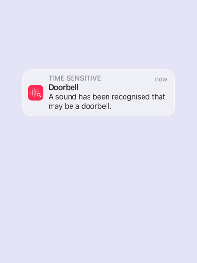 A alert notification on an iPhone displays “a sound has been recognised that may be a doorbell” based on the real-time sound.