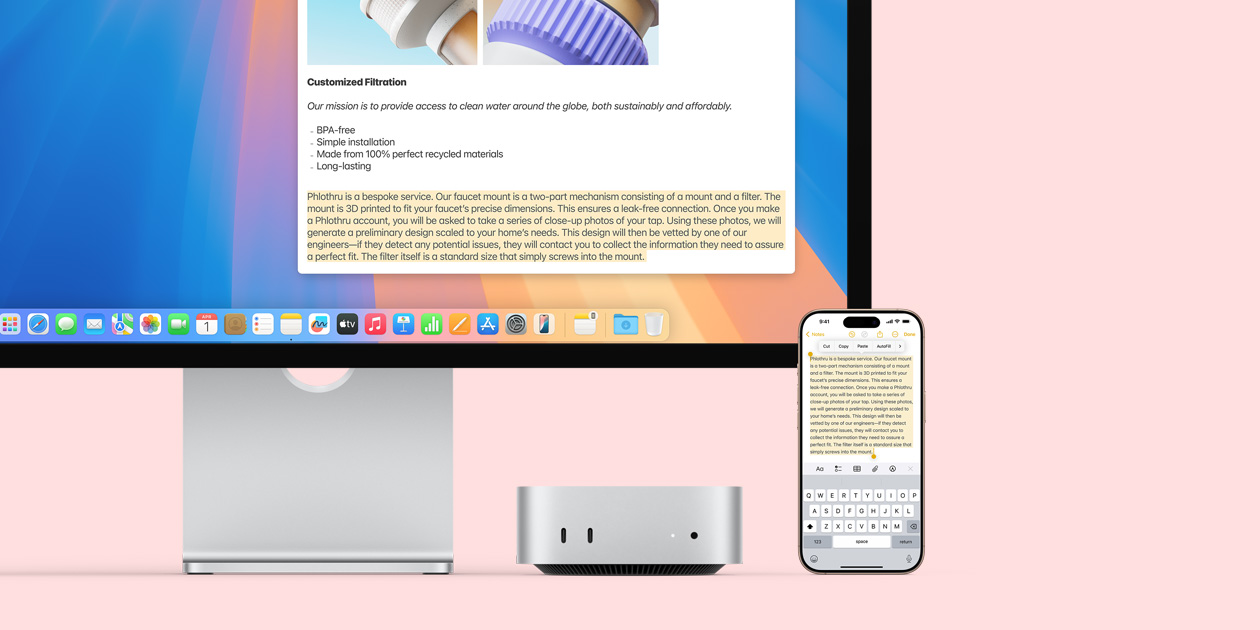 Mac 顯示器、銀色 Mac mini 和 iPhone 排成一行,顯示器和 iPhone 螢幕上展示通用剪貼板功能,從一部 Apple 裝置複製內容貼至另一部裝置。