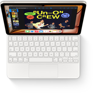Tampak dari atas iPad Air dengan Magic Keyboard berwarna putih.