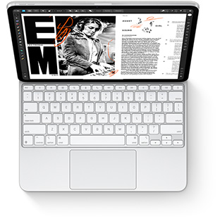 Tampak dari atas iPad Pro dengan Magic Keyboard berwarna putih untuk iPad Pro.