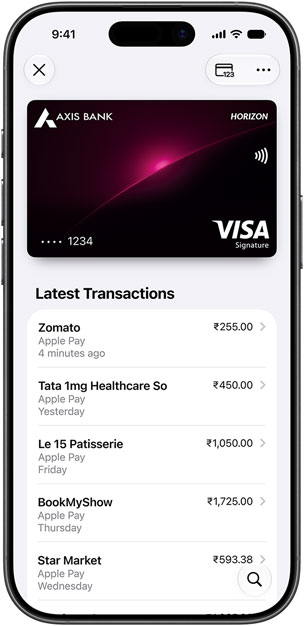 iPhone, front, displaying an Axis Bank credit card in Apple Wallet, with a list of latest transactions