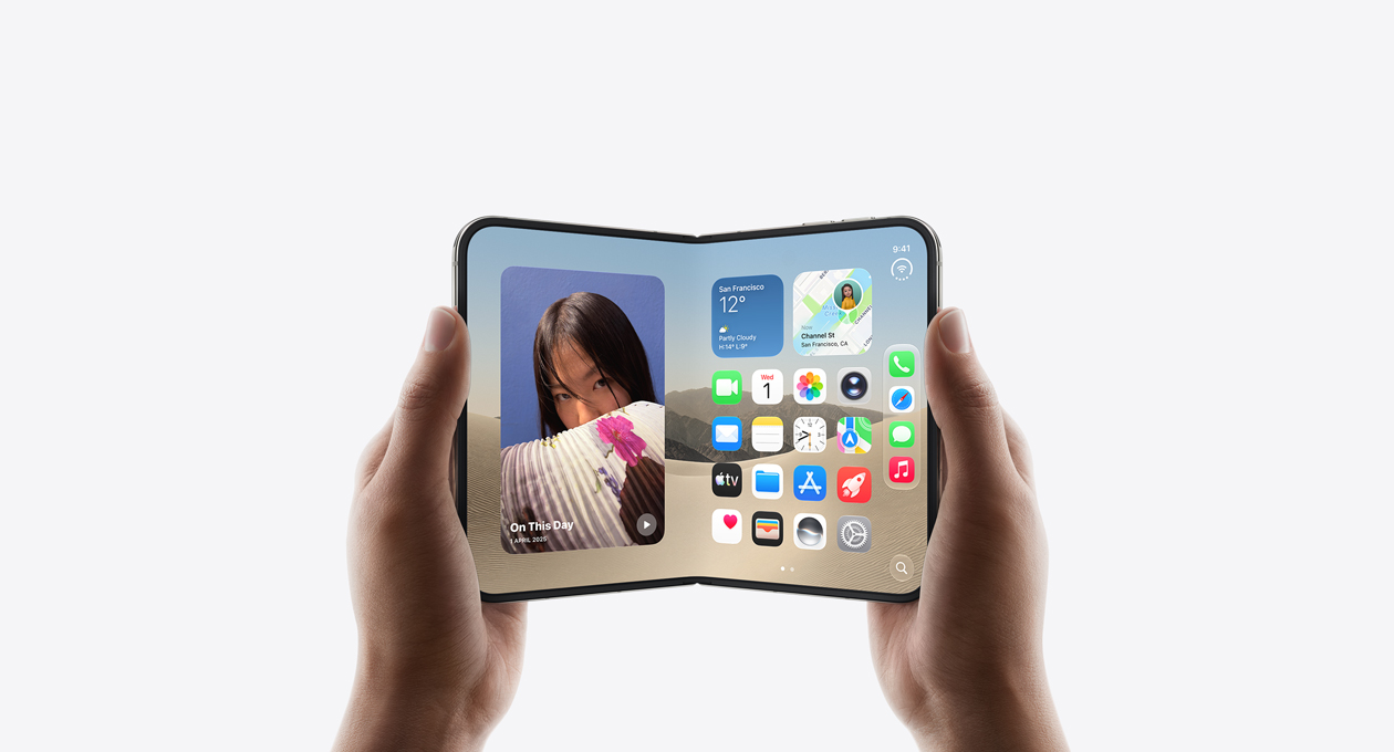 iPhone Duo, held by two hands in open landscape position, inside exterior, Star White color, iOS home screen display, photos on the left, apps on the right