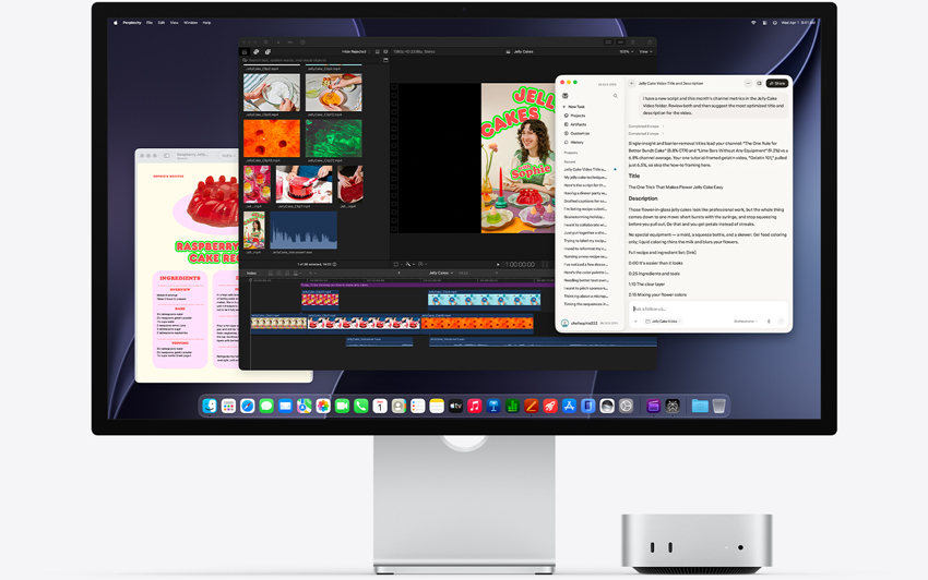 Mac mini front, tucked under Studio Display, screen shows Perplexity Personal Computer, Final Cut Pro and Pages running in macOS environment