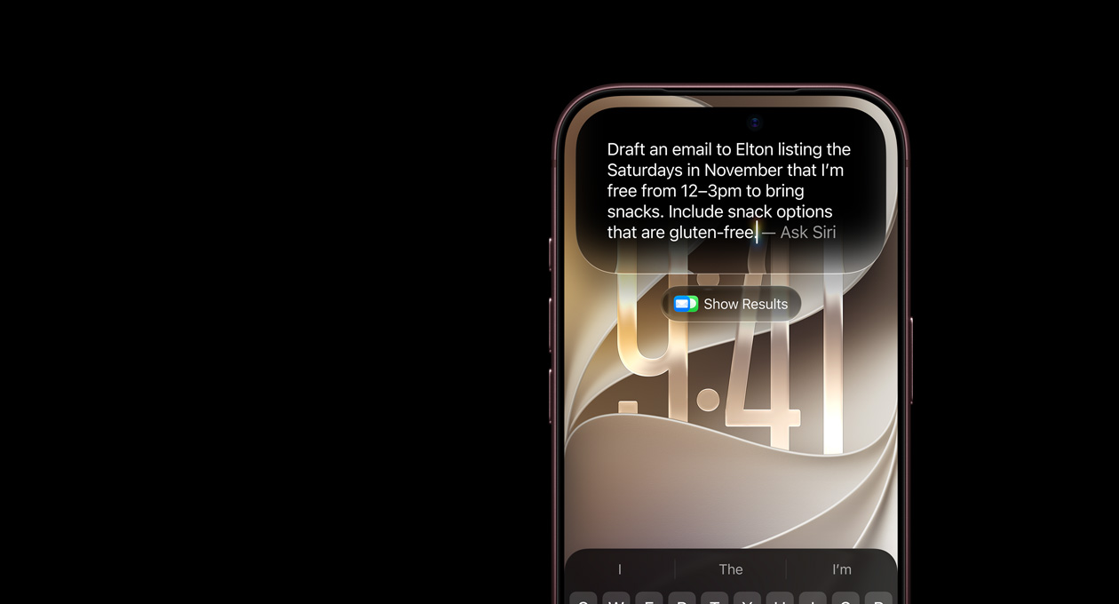 バーガンディのiPhone 18 Pro。画面に「Siriに頼む」のプロンプトが表示され、「11月中で、午後12時から3時まで時間があって軽食を持参することができる土曜日をリストしたElton宛てのEメールの下書きを作成して。グルテンフリーの軽食オプションも含めて」と書かれている