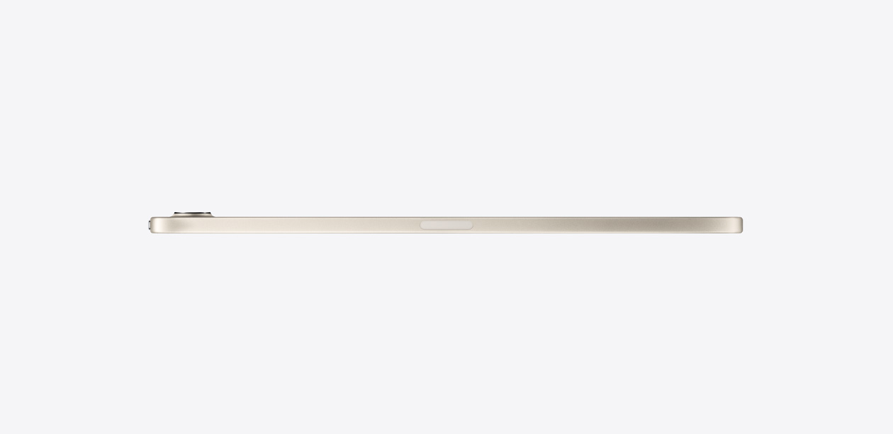 iPad mini 스타라이트 색상의 옆모습. 얇고 가벼운 디자인이 보입니다.