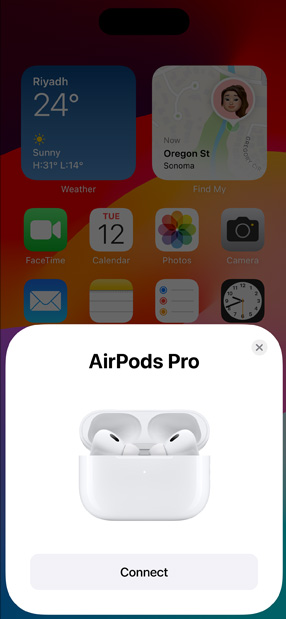 MagSafe Charging Case holding AirPods Pro next to iPhone. Small tile on iPhone home screen displays pop-up with connect button that easily pairs AirPods when tapped.