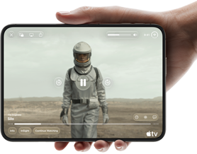 iPhone Duo, held with one hand, opened in horizontal orientation, fully unfolded, interior screen displays Apple TV show 'Silo'