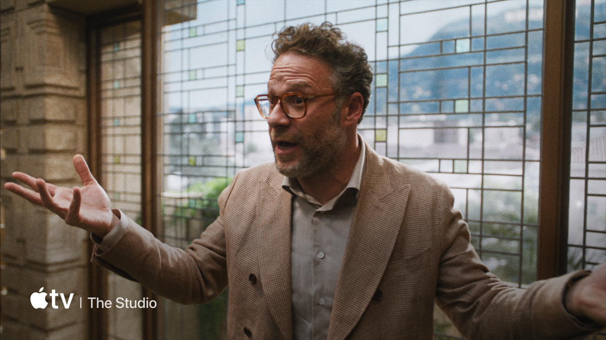 A flat-screen television showing a static image of &amp;quot;The Studio" available on Apple TV+