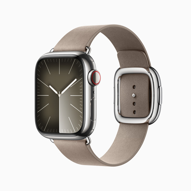 Apple Watch Series 9 in stainless steel in silver with a gray FineWoven Modern Buckle band.