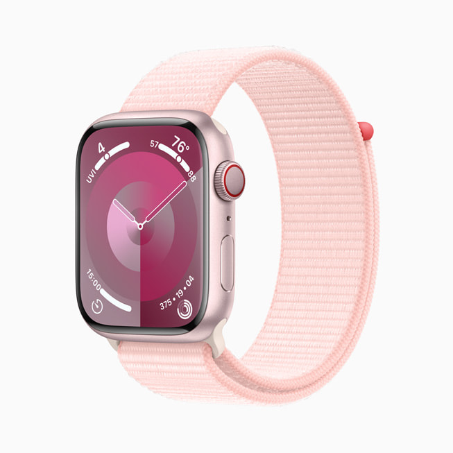 Apple Watch Series 9 in pink aluminium is shown with pink Sport Loop band.