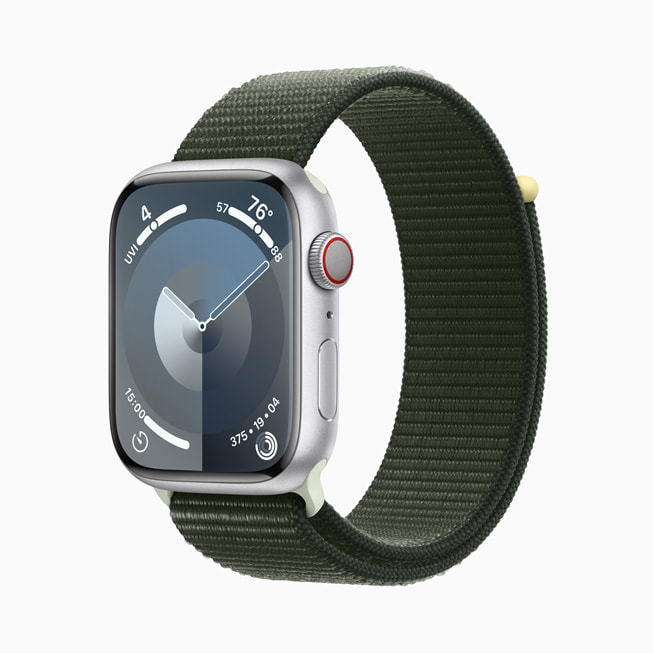 The silver aluminium Apple Watch Series 9 with the green Sport Loop.