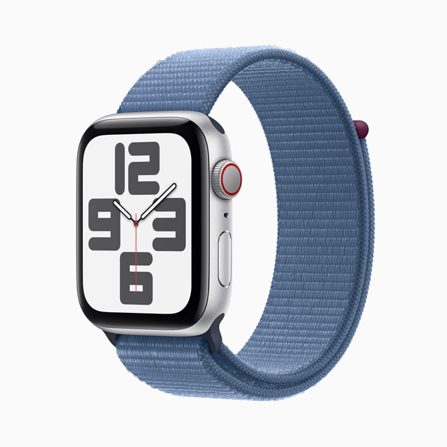 The silver aluminium Apple Watch SE with the blue Sport Loop.