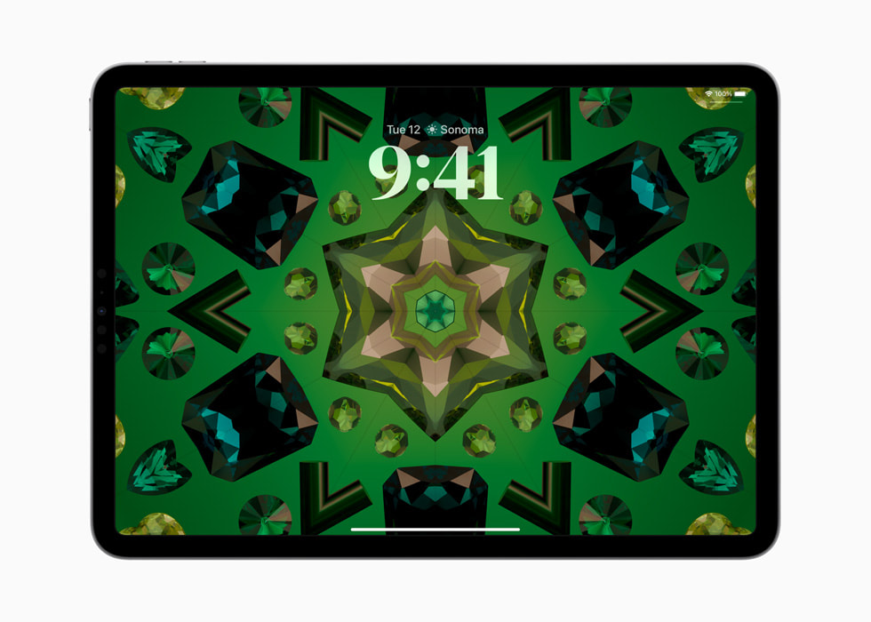 A Lock Screen with kaleidoscope wallpaper is shown on the 11-inch iPad Pro.