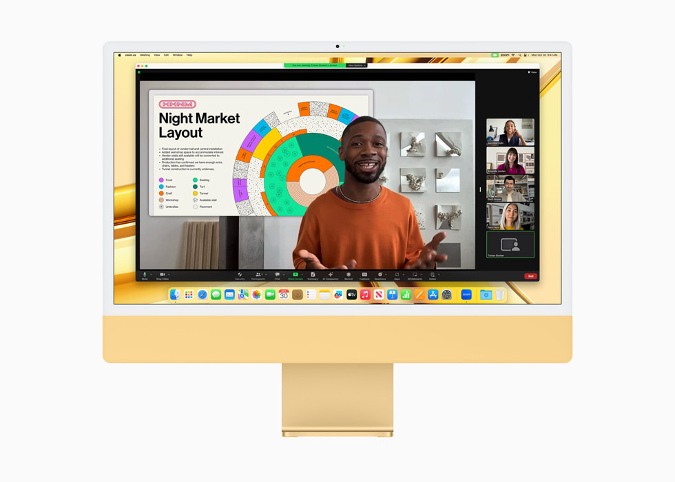 การประชุมผ่านวิดีโอแสดงอยู่บน iMac รุ่นใหม่ที่มีชิป M3 ตัวเครื่องสีเหลือง