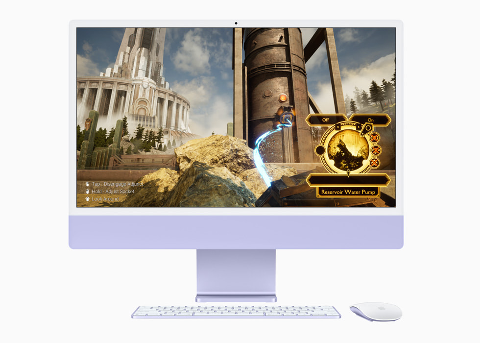 ゲーム「Firmament」が表示されているパープルの新しいM3搭載iMacと、同色のキーボードとマウス。