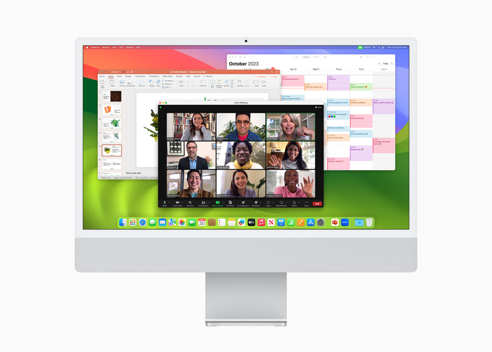 แอป Microsoft PowerPoint, แอป Zoom และแอปปฏิทินแสดงอยู่บน iMac รุ่นใหม่ที่มีชิป M3 ตัวเครื่องสีเงินที่ใช้ macOS Sonoma