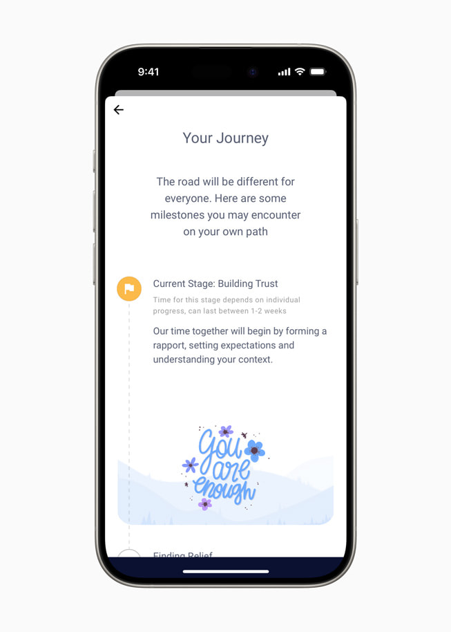 Se muestra una pantalla con el encabezado "Tu viaje" de la app Wysa en un iPhone 15 Pro.