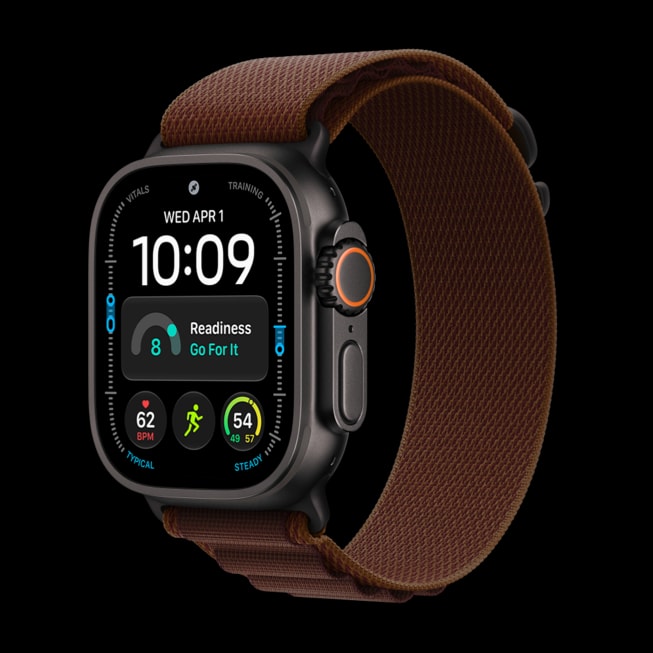 Apple Watch Ultra 4 v provedení z černého titanu s burgundsky červeným Alpským tahem.