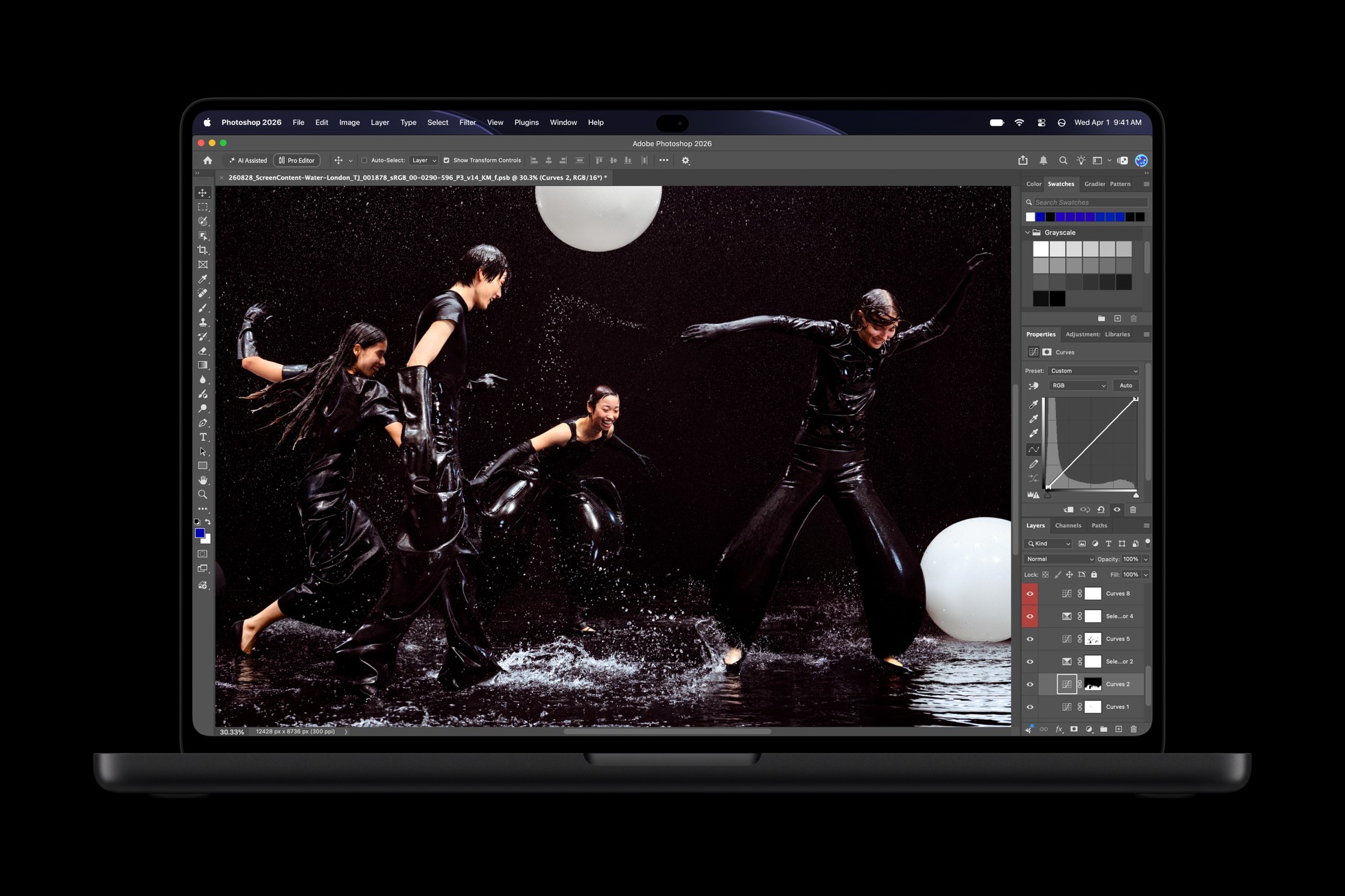 MacBook Pro displaying a photo-editing workspace in Adobe Photoshop