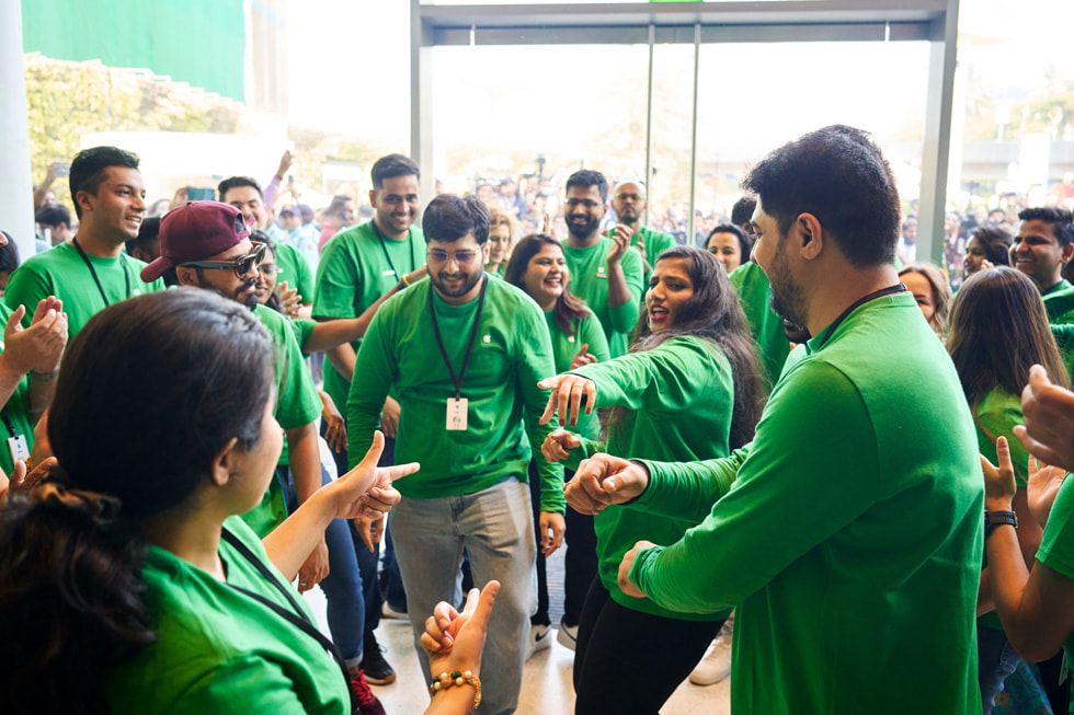 Apple BKC team members rallying inside the store before its opening.