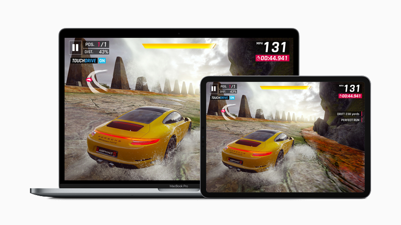 iPad and MacBook Pro displaying racing game “Asphalt 9: Legends.”