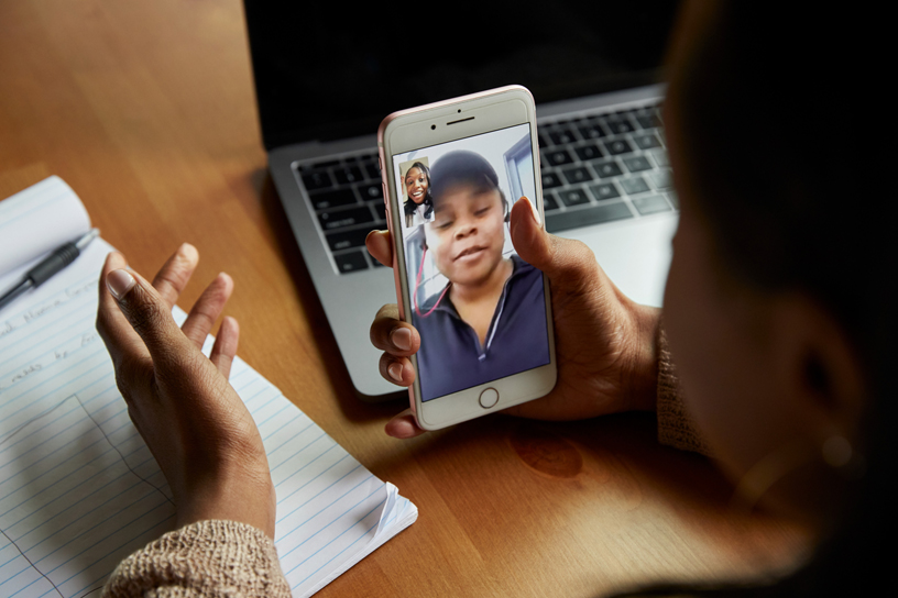 Erika Hairston uses FaceTime with her sister Kimmy.