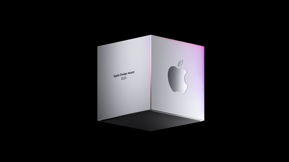 A 2023 Apple Design Award trophy is shows against a black background.