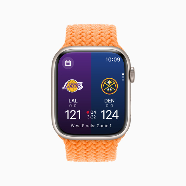 Apple Watch Series 8 shows the NBA app with the current score of a game between the Los Angeles Lakers and the Denver Nuggets displayed. 