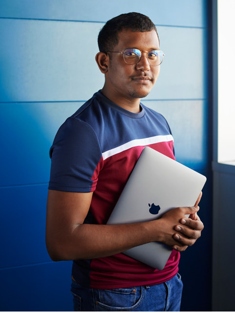 Naples Developer Academy student Aristide Lauga is shown in a headshot.