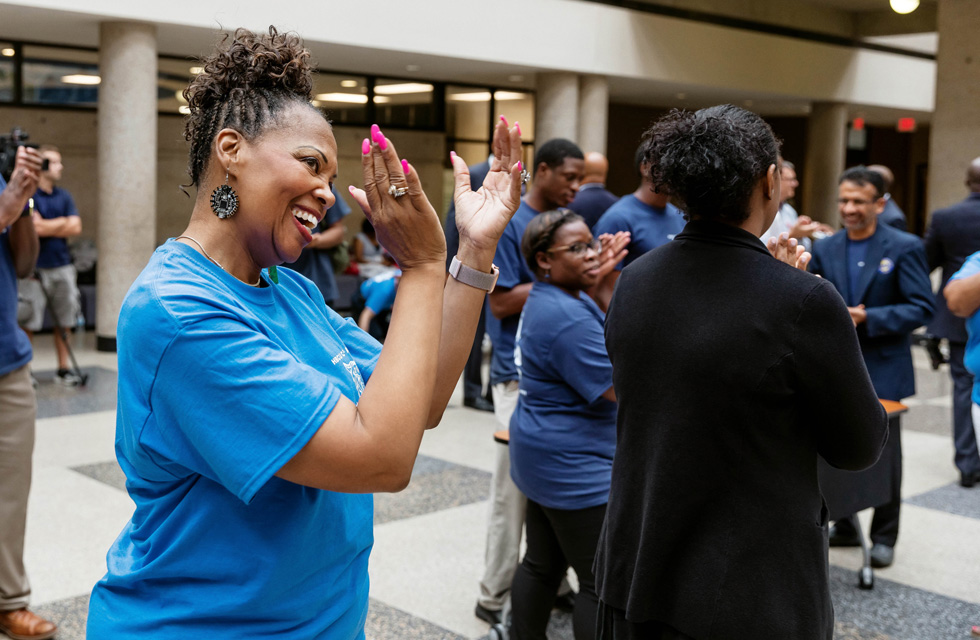 Dr. Robbie Melton claps her hands. Melton has been an advocate for bringing coding opportunities to HBCUs.