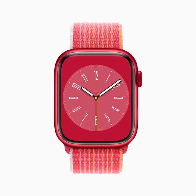 Metropolitian-urskive i rød på Apple Watch Series 8 med urkasse i aluminium og Sport Loop i (PRODUCT)RED.
