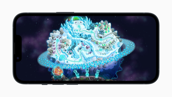 On iPhone 14, a still from the game Iron Marines+ shows an icy planet covered in mountains.