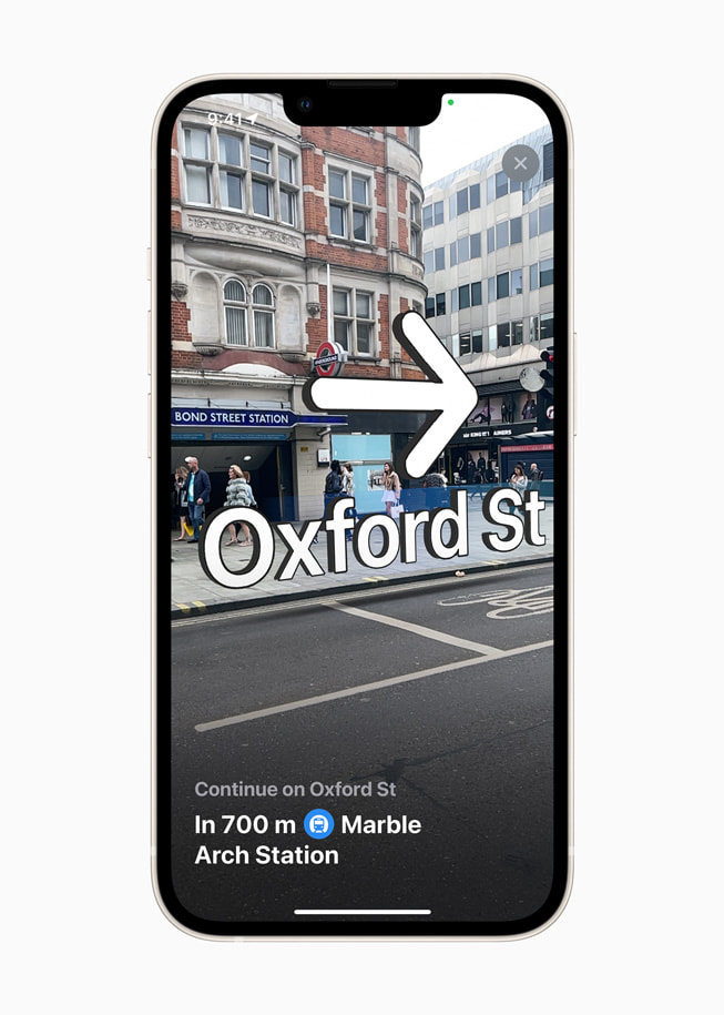 iPhone shows step-by-step walking guidance in augmented reality in Apple Maps in iOS 15.