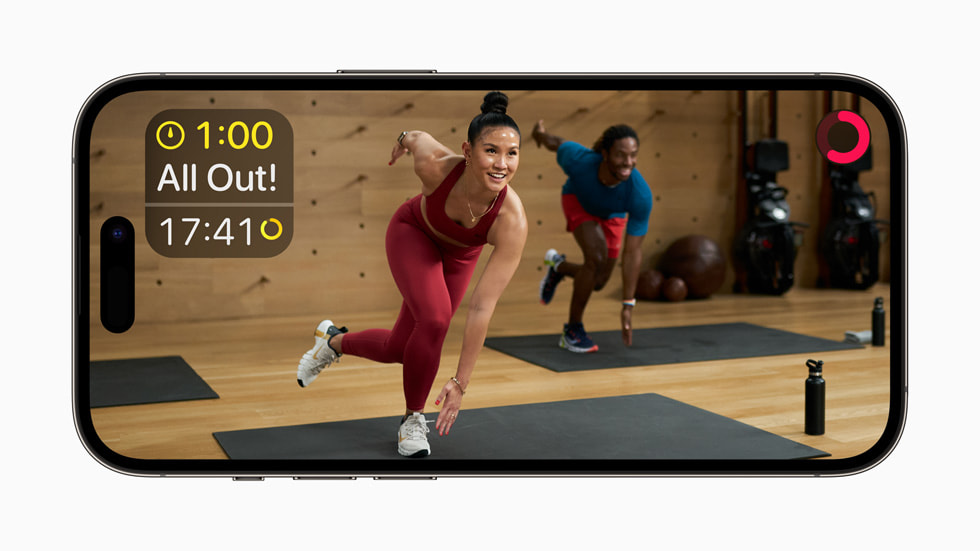 An Apple Fitness+ workout is shown on iPhone.