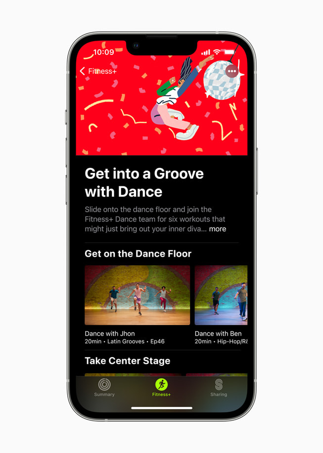 An iPhone screen shows the Fitness+ workout “Get into a Groove with Dance.”