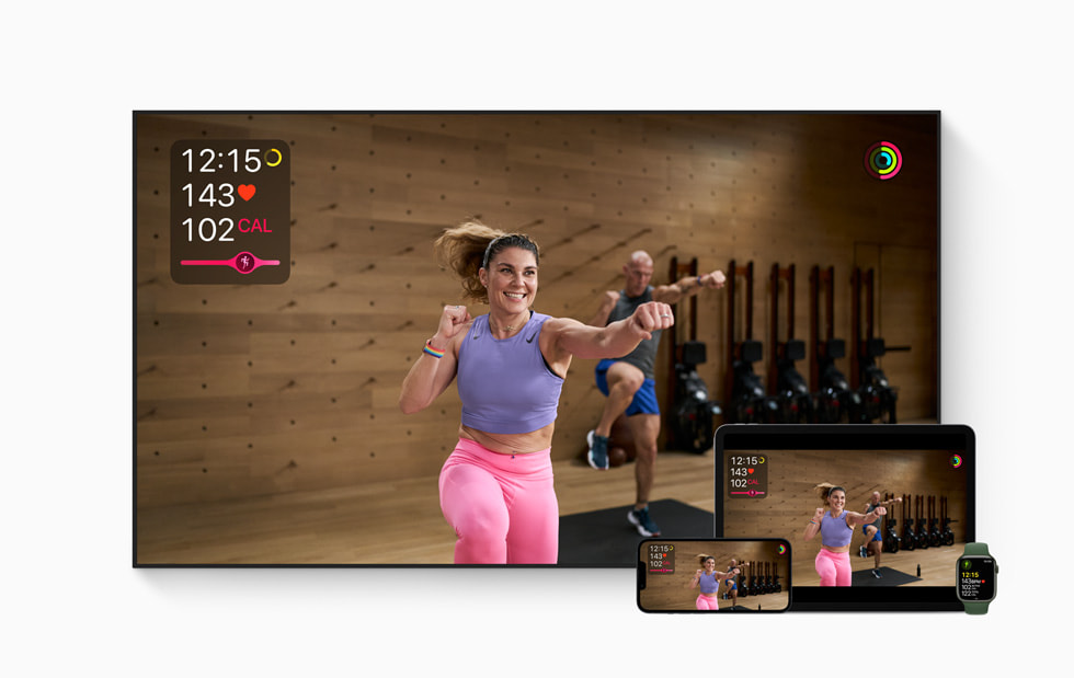 A trainer shows workout moves in Apple Fitness+.