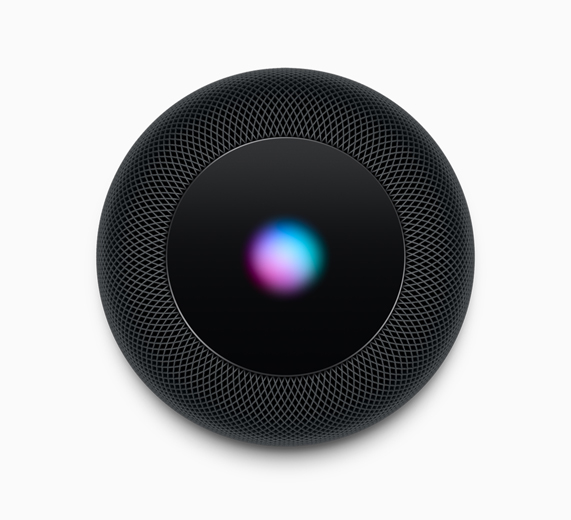 A photo showcasing the HomePod in black, viewed from the top down.