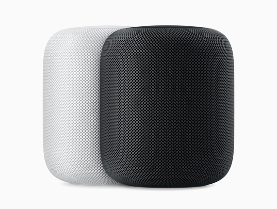 HomePod speakers in white and space gray.